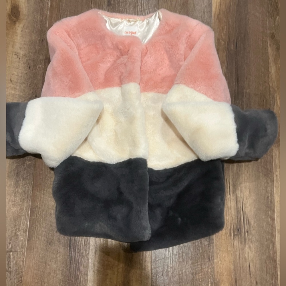fluffy on outside silk on inside. Coat